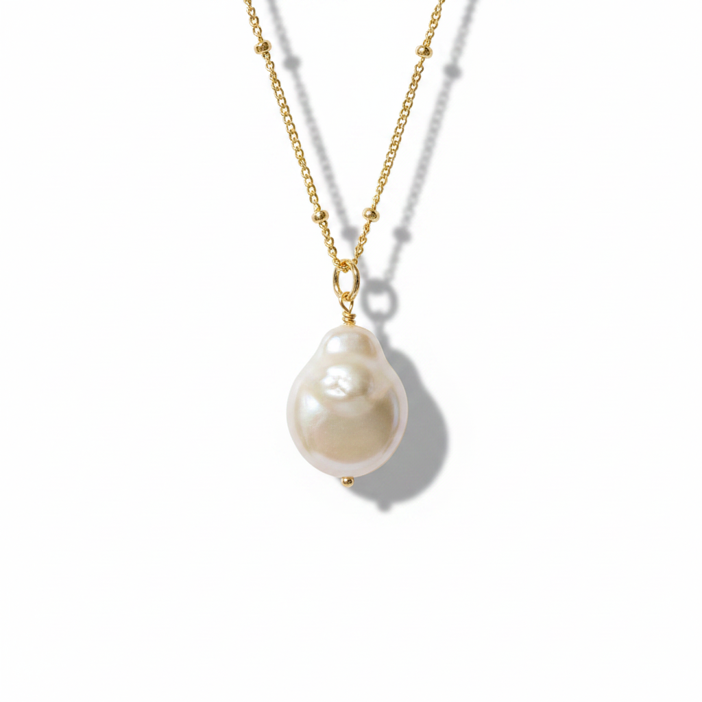 Baroque Pearl Pendant Necklace — White Background Editorial