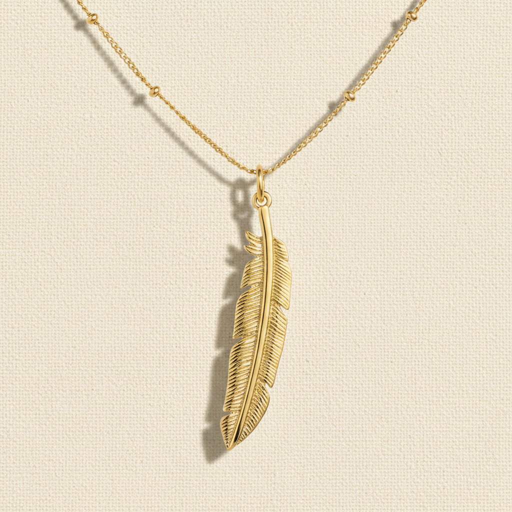 Gold Feather Pendant – Warm Canvas with Sun Shadow