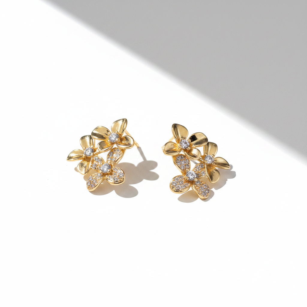 Gold Flower & Butterfly Earrings — White Background Editorial