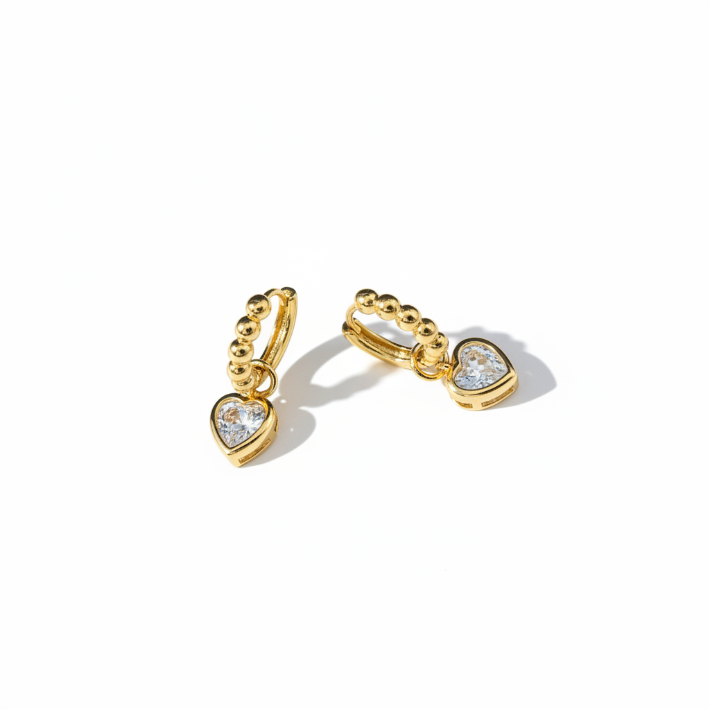 Gold Heart Crystal Hoop Earrings on White