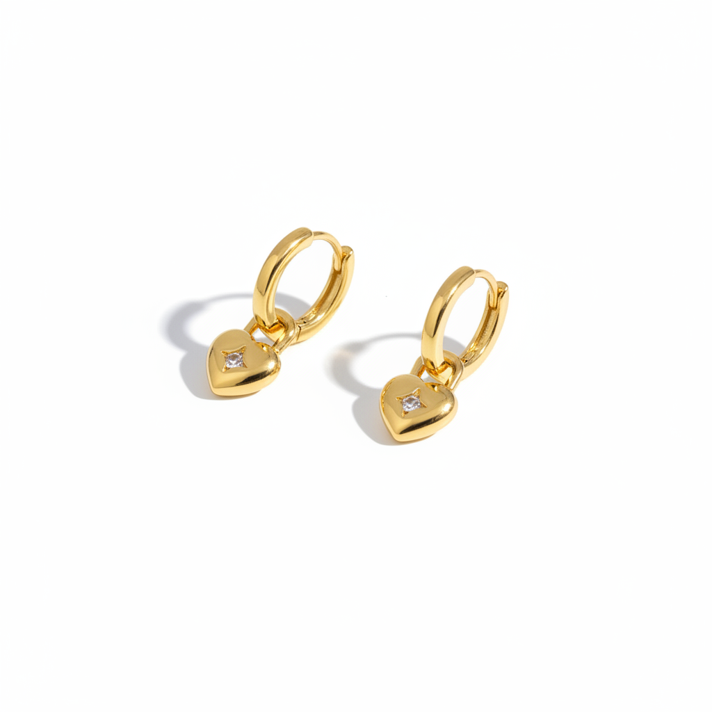 Gold Heart Huggie Earrings – White Background