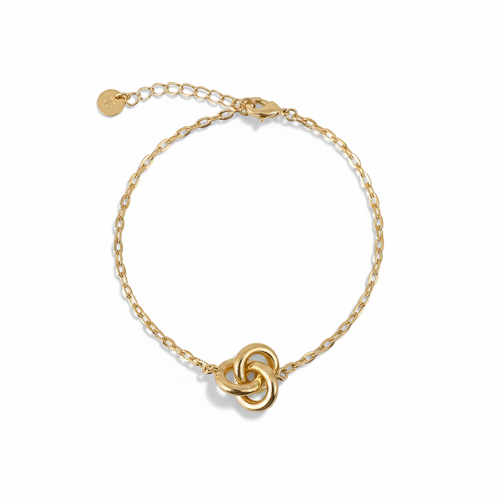 Gold Knot Bracelet with Shadow on White Background