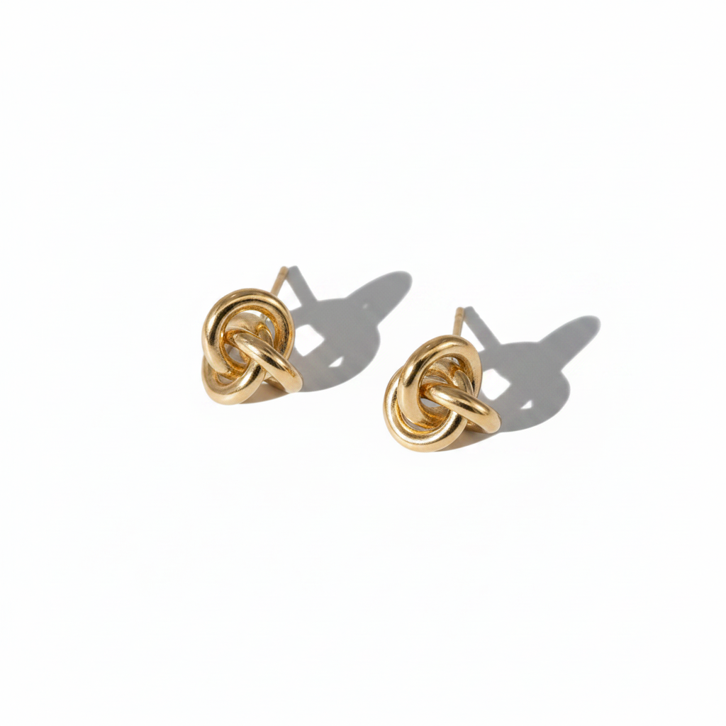 Gold Knot Earrings — High Editorial Shadow