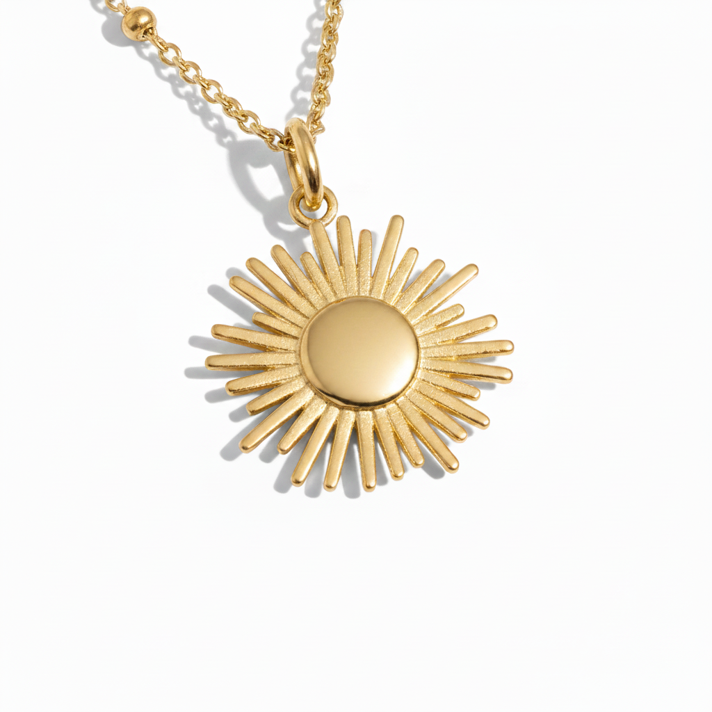 Gold Sun Pendant — Chain Removed Bottom Right