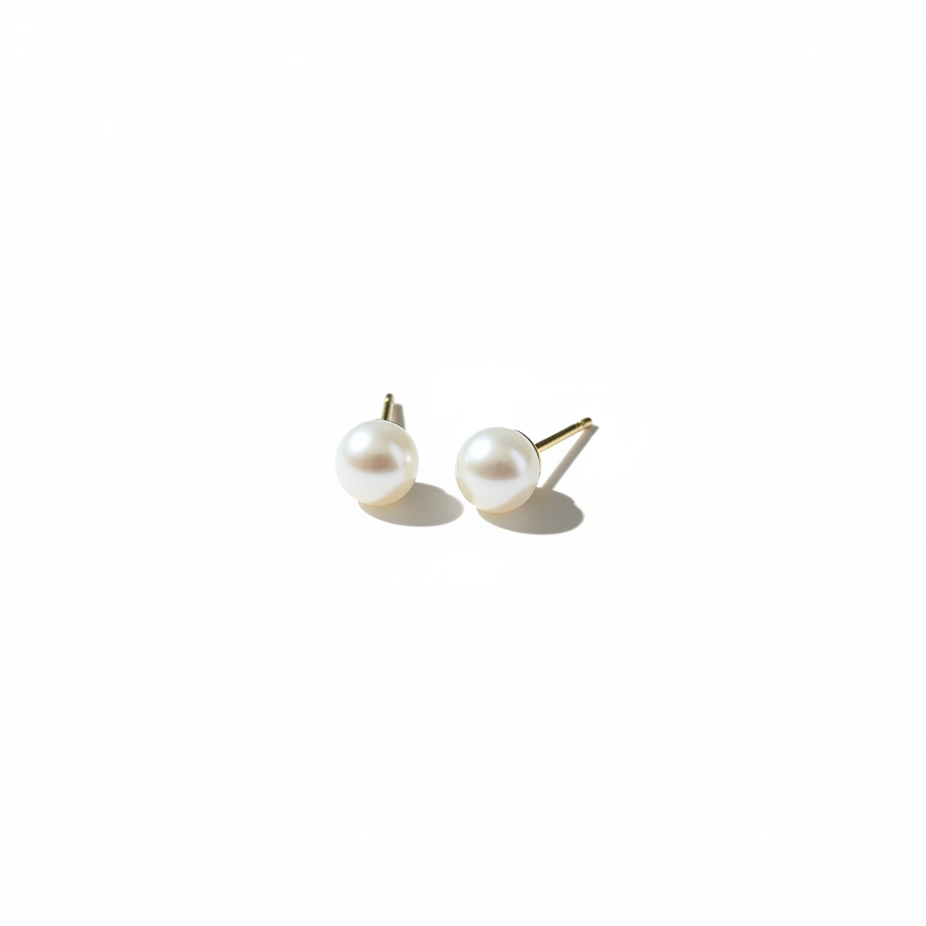 Pearl Stud Earrings — White Background Editorial