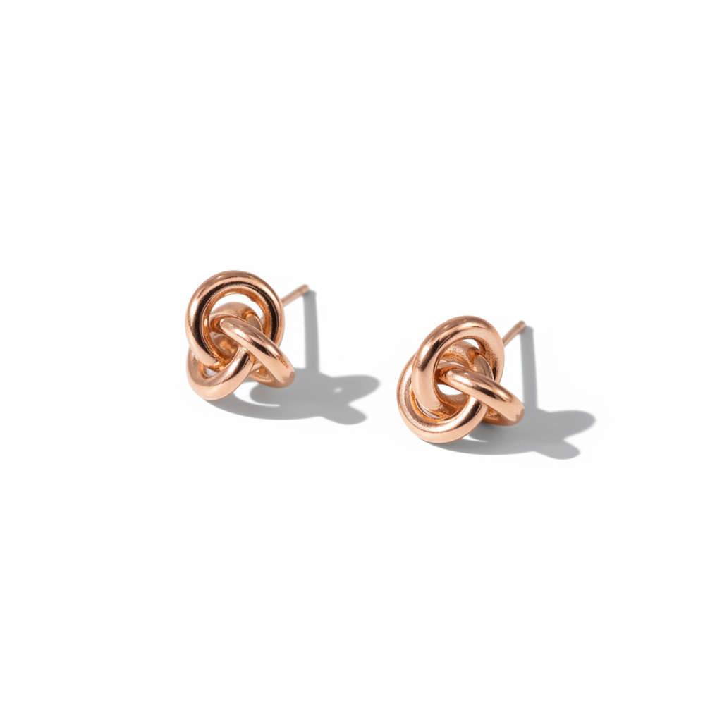 Rose Gold Knot Earrings — High Editorial Shadow