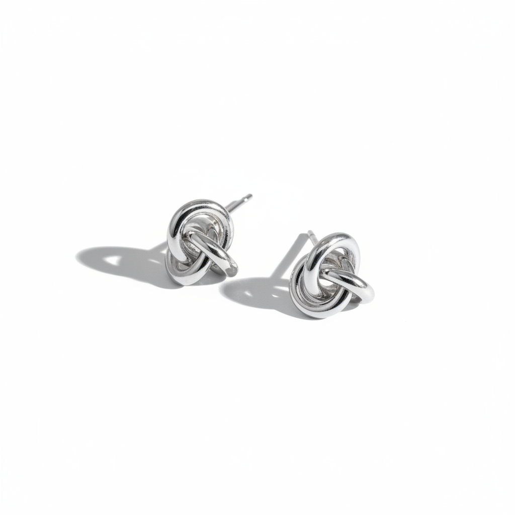Silver Knot Earrings — High Editorial Shadow